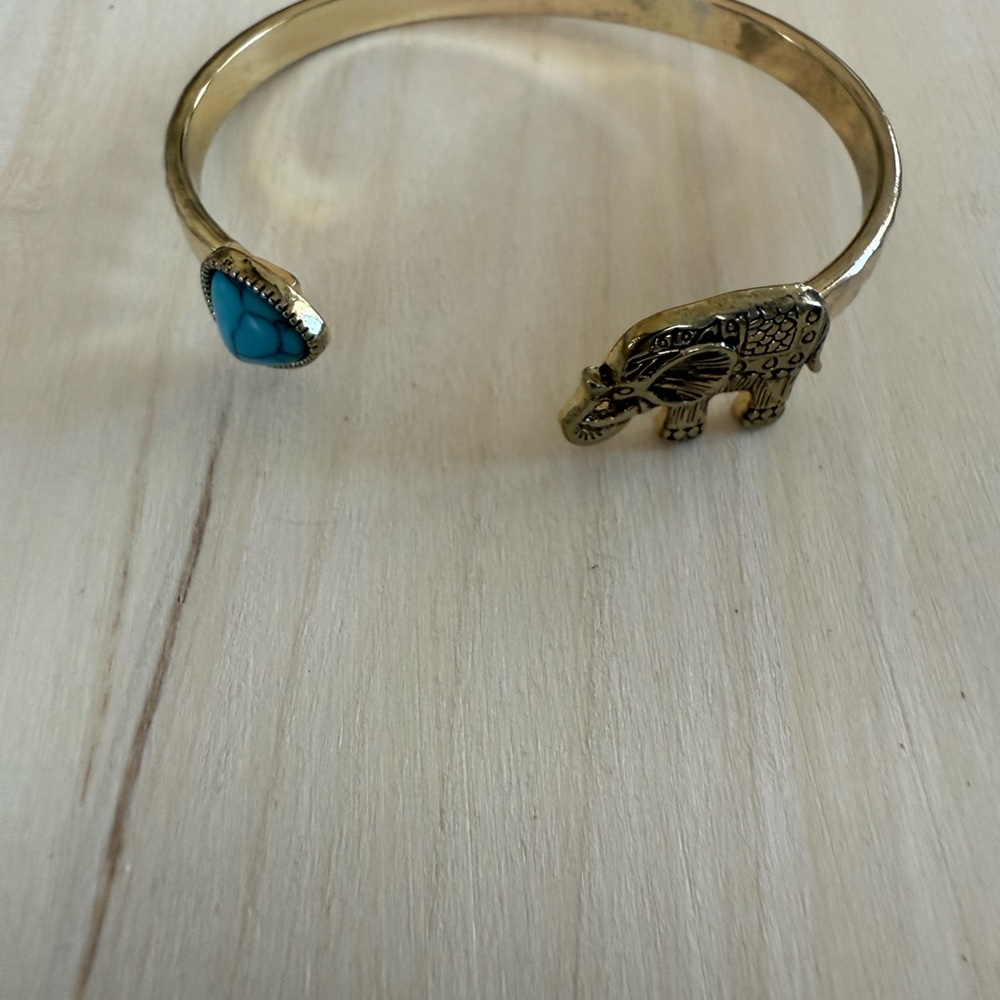Gold Bangle with Turquoise Stone and Animal Design